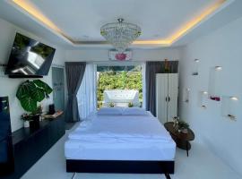 บ้านสวนจมูกโต، فندق في Ban Pha Mi