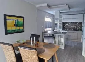 Central, parking and 10 min walk to train station