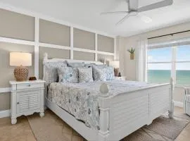 Renovated direct oceanfront corner 2/2 with a large balcony, heated pool, and garage
