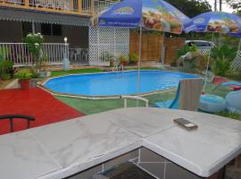 Appartement cosy près de Morne-à-l'Eau avec piscine, Hotel in Morne-à-lʼEau