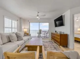 Updated direct oceanfront corner 2/2 with stunning beach views, a heated pool, and parking garage