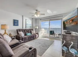 Direct oceanfront 2/2 condo with large private balcony, heated pool, and garage parking