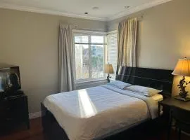 A cozy en-suite on the second floor with independent entranceclose to YVR