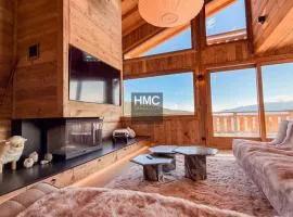 Agane skis aux pieds jacuzzi et vue montagne