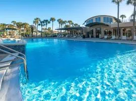 Free golf cart with easy beach access and resort amenities, pool, tennis, and more