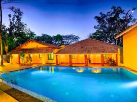 ELIVAAS Terra Rosa Portuguese-styled 4-BHK Villa With Private Pool, Garden, Veranda & Sit-out Area, hotell i Maem