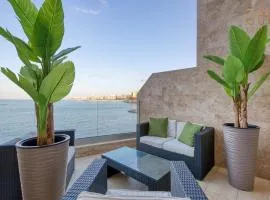 2BR Seafront Elegance with Balcony & Sea Views by 360 Estates