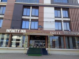 Infinity inn, готель у місті Guna