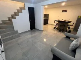 Casa cerca del aeropuerto con dos habitaciones todo incluido