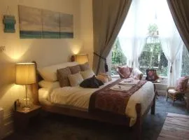 The Rose Room, Clarence Cottage, superior ground floor suite