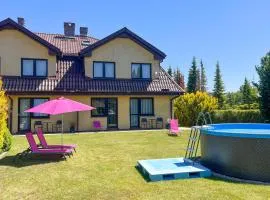Beautiful Apartment In Rowy With Swimming Pool