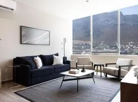 Modern Apartment with City Views and Pool Access