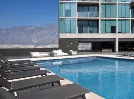 Mountain-Facing Apartment with Pool Gym & Balcony