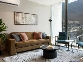Mountain-Facing Apartment with Pool Gym & Balcony