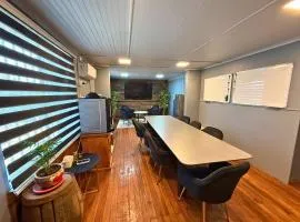 Hospedaje céntrico con AACC, baño privado, TV con plataformas y espacio cowork