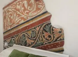 Bright frescoed attic in the city center, Brescia