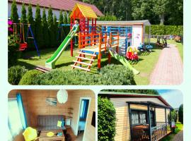 AIDA Domki Letniskowe - domki 5 min od MORZA - Plac Zabaw & ANIMACJE dla DZIECI: Rewal şehrinde bir otel