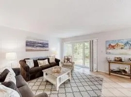 2-story condo with on-site pool, private patio, & W/D - near beach/golf