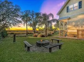 Inviting waterfront cottage w separate garage apartment and stunning marsh view