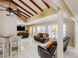 Home near the beach & golf with inviting patio, fireplace, AC, & washer/dryer