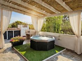 Splendido Appartamento San Teodoro Budditogliu con Jacuzzi, Hotel in San Teodoro