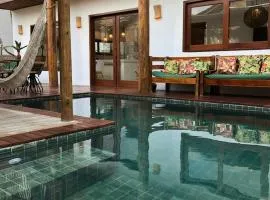 Casa Flor de Biriba - Casa de Suítes