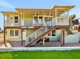 Updated home across from beach with covered balcony, central AC, & washer/dryer