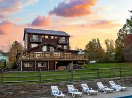Mins to Hunter Mountain • Sleeps 36 • Pool Spa Games Bar Cozy Peaks Lodge by AvantStay