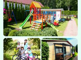 AIDA Domki Letniskowe - domki 5 min od MORZA - Plac Zabaw & ANIMACJE dla DZIECI, hotel di Rewal