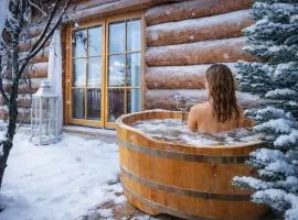 Chaty Świerkowe Wzgórze - domki typu superior z sauną balią kominkiem i domki-bez sauny balii kominka