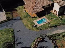 Casa Beira Rio | Piscina, churrasqueira e beach tennis.
