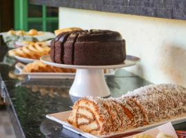 Pousada do Mica, hótel í Praia do Rosa