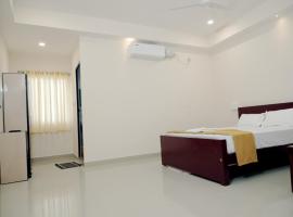 Amritha Lodge, хотел в Kollengode