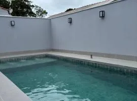 Casa com piscina praia do ervino