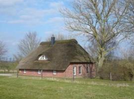 Augustgroden में, होटल Holiday Home Reetdachkate in Stadland-Seefeld by Interhome