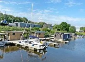 Holiday Home Hausboot KHT 2 Lacet mit Elektrokamin im Salon- 1 Schlafraum- Küche- Duschbad m by Interhome