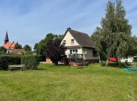 Apartment Rügenferienhaus Wohnung EG-OG by Interhome