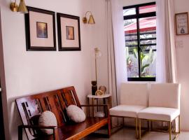 Secluded, Modern, Minimalist house - Gray House, hotel sa Dampalan