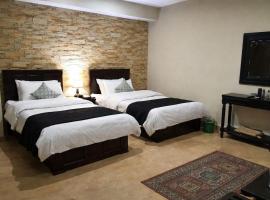 Cigarlodges Murree, hotell i Murree