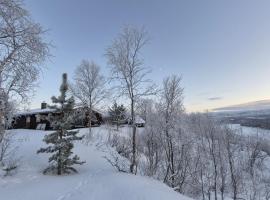 Hytteparadis ved Neidenelva, hotel di Neiden