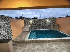Casa com piscina privativa, churrasqueira e 2 suítes - Condomínio Costa Rica - Itanhaém - lado praia