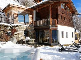 Bergchalet h e i m a t, hotell i San Martino