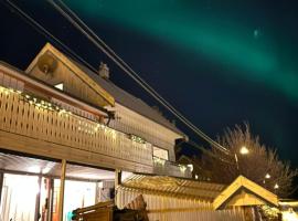 Room for man with sea view, boathouse, garage and boat, hotel a Kvalsund