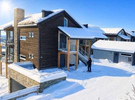 Utsiktsleilighet med ski in out på Hafjell 7 sengeplasser โรงแรมในHunder