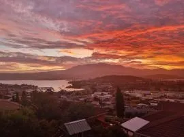The Lookout with City water and Mountain views