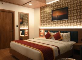 Celestial International, hotell i Taliparamba