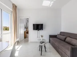 Apartment with AC and Balcony Golem by PikHost