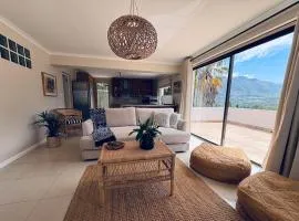 Central & secure, with mountain & ocean views