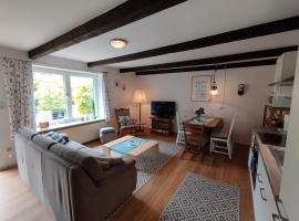 FeWo Villa Butterburg Tomke - Reihenhaus mit Terrasse, hotel di Dornum