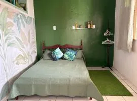 Quarto aconchegante no centro